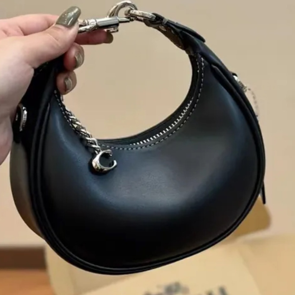 Coach Jonie mini in black and silver